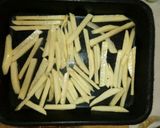 Foto del paso 4 de la receta: Papas bastones al horno
