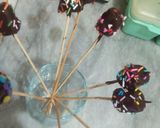 A picture of step 5 of 1 bite chocolatey marshmallow pops.