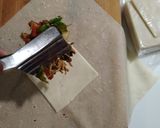 A picture of step 4 of Chicken cheese spring roll.