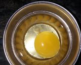 A picture of step 2 of Egg omelette sandwich.