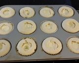 A picture of step 18 of White Chocolate Truffle Cupcakes with Whipped White Chocolate Mascarpone Frosting.