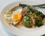 A picture of step 5 of Grilled pork loin served with rice & fried egg.