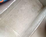 A picture of step 6 of Oreo vanillah cake loaf.