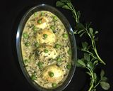 A picture of step 14 of Egg in white gravy.