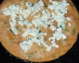 A picture of step 4 of Nutritients packed Cucumber and Tomato chilla with paneer filling.
