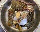 A picture of step 1 of Deluxe Seafood Knife-Cut Noodles.