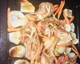 A picture of step 3 of Grilled Lamb chops with potatoes and carrot including rice with veggies.