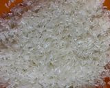 A picture of step 1 of Grilled Chicken Thighs with Rice, Steamed Veggies & Tomato Gravy.