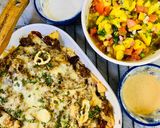 A picture of step 10 of Loaded Nachos with Mango Salsa, Sour cream and cheese sauce.
