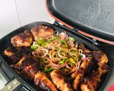 A picture of step 4 of Grilled chicken thighs and breasts.
