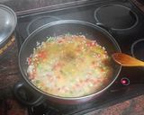Foto del paso 5 de la receta: Habichuelas compuestas con carne de cochino, papas fritas y huevo duro