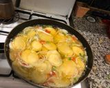 A picture of step 3 of Spanish Potato Omelette with Onion and Peppers.