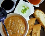 A picture of step 4 of Hot and sour soup with cheesy bread stick.