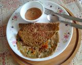A picture of step 6 of Crispy Whole Green Gram dal and vegetable chila.