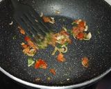 A picture of step 7 of Stuffed clams gravy.