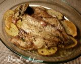 Foto del paso 5 de la receta: Dorada al horno, con patatas y ajos