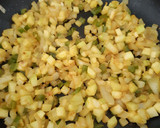 Foto del paso 3 de la receta: Risotto de calabacín, espinacas y salmón con rulo de cabra