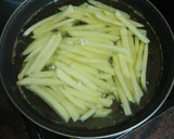 Foto del paso 12 de la receta: Palomitas de cerdo adobado en salsa de almendras y papas fritas