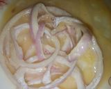 A picture of step 3 of Stuffed chicken with macaroni and onion rings.