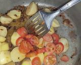 A picture of step 3 of Aloo and Matar pulao.
