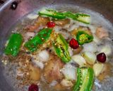 A picture of step 2 of Chicken yakhni pulao.
