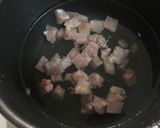 A picture of step 1 of Japanese mushroom and chicken soup.