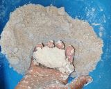 A picture of step 3 of Wholegrain chapati with onion and coriander.