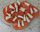 Foto del paso 5 de la receta: Pescado frito con tomates y queso fresco