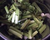 A picture of step 1 of Green garlic mint leaves coriander chutney green chutney.