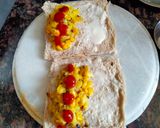A picture of step 2 of Cheesey Bread pockets with Italian filling.