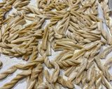 Foto del passaggio 3 della ricetta Fusilli (fatti in casa) con il pesto di basilico e nocciole 🍝🌱