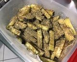 Une image de l'étape 6 de Frites d'aubergines au four aux herbes de Provence et épices.