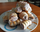 Foto del paso 3 de la receta: Cañoncitos rellenos de dulce de leche express 😋