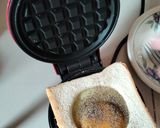 A picture of step 2 of Waffles egg sandwich.