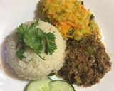 A picture of step 11 of Celery and minced meat stir fry served with rice.