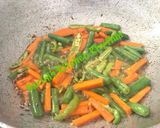 A picture of step 2 of Vegetable lemon rice.
