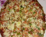 A picture of step 5 of Desi pizza.