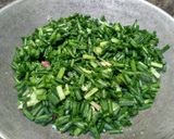 Foto langkah ke 6 dari resep Tumis daun bawang merah.