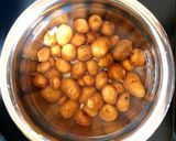 A picture of step 1 of Baby Potato Korma.