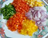 A picture of step 3 of Cheesy Mexican Veg Pizza.