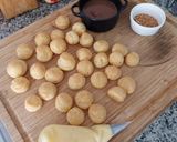 Foto del paso 6 de la receta: Miniprofiteroles rellenos de crema de limón con cobertura de toffee y crocanti