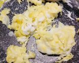 A picture of step 2 of Smoked salmon and scrambled egg on toasted oregano bread.