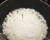 A picture of step 2 of Pathiri (Rice flour Roti) with chana.