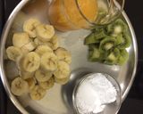 A picture of step 1 of Banana kiwi Smoothie with orange juice.