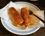 Foto del paso 4 de la receta: Rulos de pan bimbo con jamón dulce y queso griego