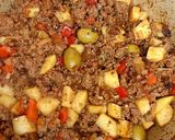 A picture of step 9 of Cuban Beef Picadillo.