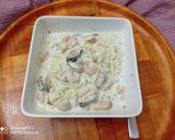 Gluténmentes köles tészta tenger gyümölcseivel recept fázis 2 fotója