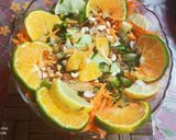 A picture of step 6 of No Cook Recipe Raw papaya sweet and sour salad.