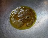 A picture of step 1 of Rava tomato upma.