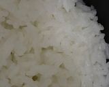 Foto langkah ke 1 dari resep Tips Mengurangi air pada nasi yang dimasak kelembekan.